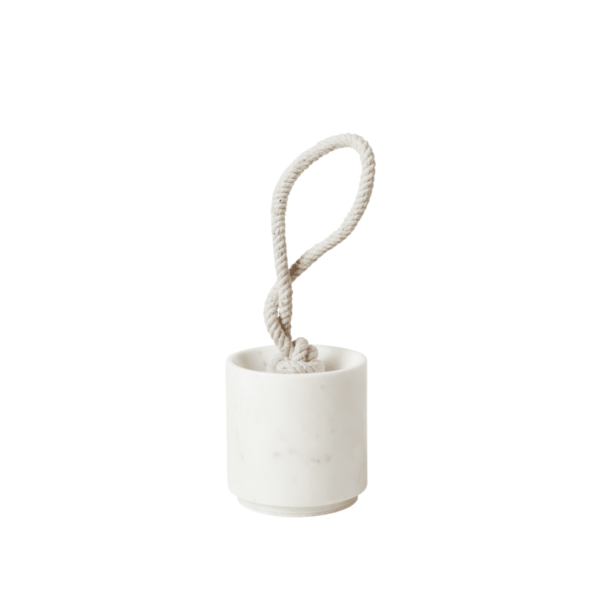 Stylish white marble door stop that also serves a practical purpose.