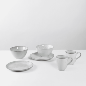 Introducing the Nordic Sand Breakfast Set for Two by Broste Copenhagen. This set includes two bowls, two plates and two mugs.