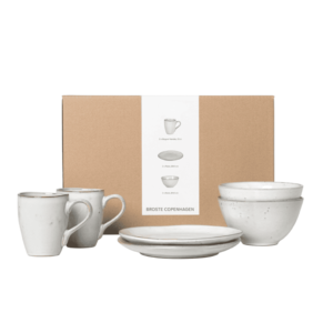 Introducing the Nordic Sand Breakfast Set for Two by Broste Copenhagen. This set includes two bowls, two plates  and two mugs.