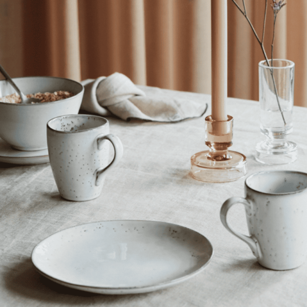 Introducing the Nordic Sand Breakfast Set for Two by Broste Copenhagen. This set includes two bowls, two plates and two mugs.