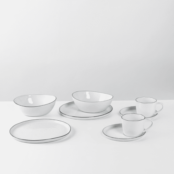 Introducing the Salt Breakfast Set for Two by Broste Copenhagen. This set includes two plates, two bowls, and two cups with saucers.