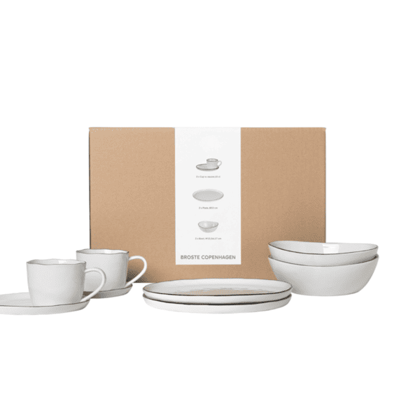 Introducing the Salt Breakfast Set for Two by Broste Copenhagen. This set includes two plates, two bowls, and two cups with saucers.