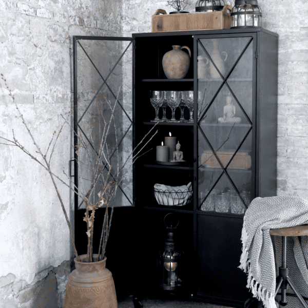Black Display Cabinet with glass doors displaying rustic home decor pieces.