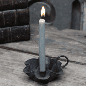 Chic Antique Reclaimed Candlestick Holder with a grey taper candle.
