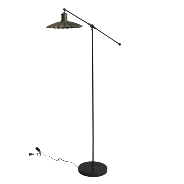 A vintage style floor lamp, finished in an antique brass colour.