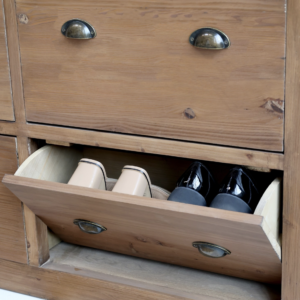 A stylish shoe cabinet, perfect for all of your storage needs. It has four shoe drawers, and each can contain up to four pairs of shoes. You will also find seven regular drawers of varying size.