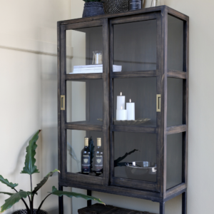 Showcase your treasured items in style with this beautiful display cabinet with sliding doors. Made from Pine wood, MDF, Fir wood, Iron and Glass.
