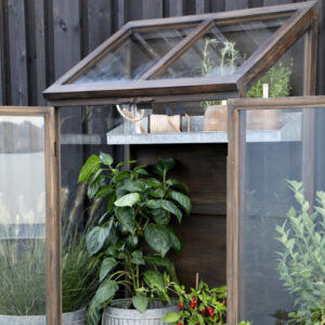 Nurture your plants in style with this beautiful greenhouse.