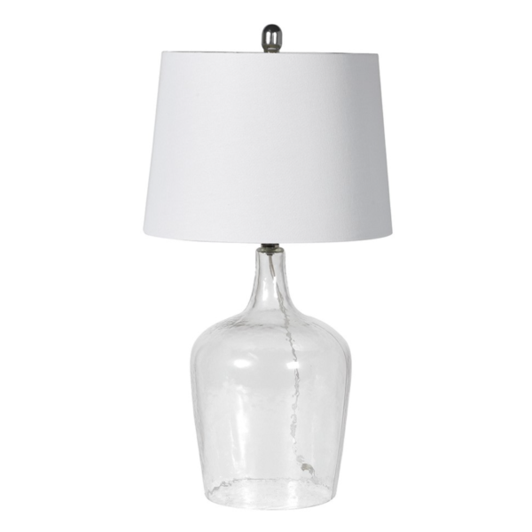 The emery is a clear glass table lamp in a charming bottle shape. Complementary lampshade Is included.