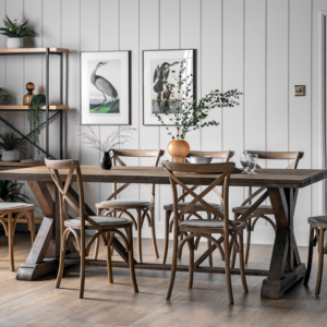 This stunning dining table is crafted from solid mango wood, with an x-shaped end frame feature on the base adding strength and stability, as well as design style, to create a table that will stand the test of time. The wood has a lightly sand-blasted finish to give texture and show the natural colour and grain of the timber.