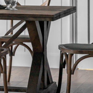 This stunning dining table is crafted from solid mango wood, with an x-shaped end frame feature on the base adding strength and stability, as well as design style, to create a table that will stand the test of time. The wood has a lightly sand-blasted finish to give texture and show the natural colour and grain of the timber.