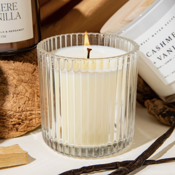 The rich, creamy aroma of milky coconut and bourbon vanilla meets the warmth of soft cashmere and sandalwood, with just a touch of musk in this decadent candle.