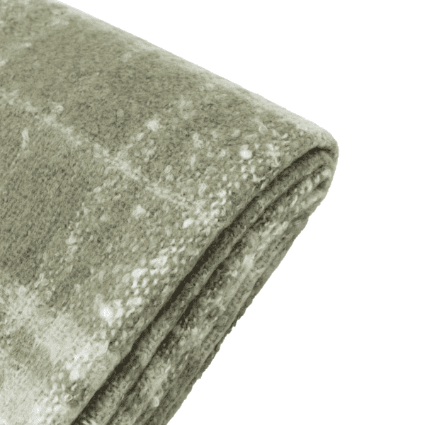 Soft and comfy this green check faux mohair throw with tactile fringing detail will bring a cosy charm to your space.