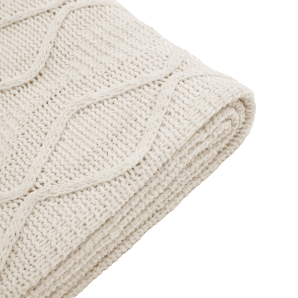 Super soft chunky cable knit diamond throw in cream with a rib knit border. This throw offers a cosy and rustic feel and is available in 2 colourways. Crafted in India.