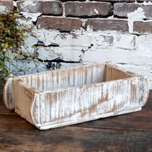 Chic Antique whitewashed brick mould with exposed brick wall background