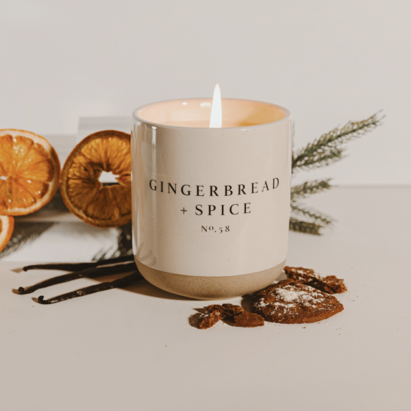 Sweet Water Decor Gingerbread and Spice 12 oz Soy Candle with festive background