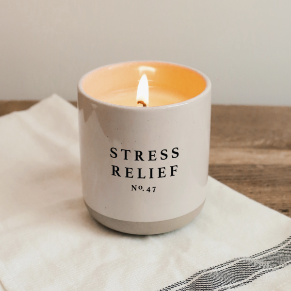 Stress Relief Soy Candle In Stoneware Jar On Wooden Background