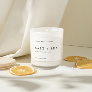 Salt And Sea Soy Candle In White Jar Shoot Image With Oranges And Sea Salt