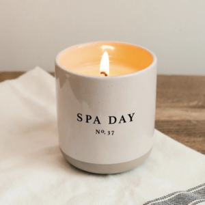 Sweet Water Decor Spa Day Soy Candle In Stoneware Jar On Wooden Bench