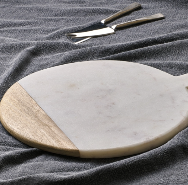 Nkuku Bwari Round Marble Board On Textured Table Cloth Side View